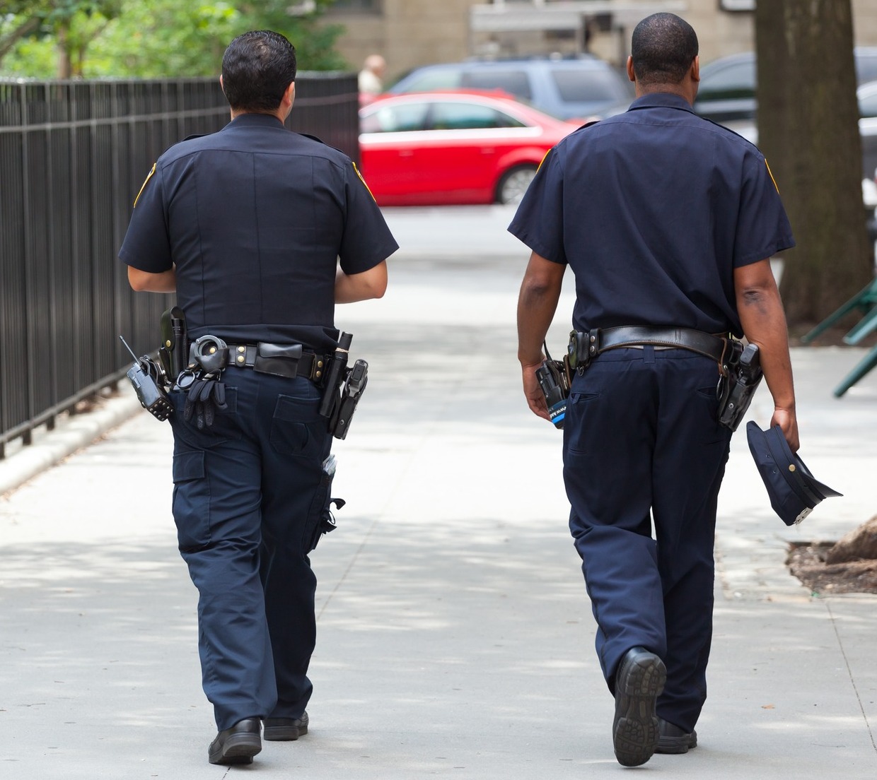 Two police officers walking - what to wear to physical therapy.